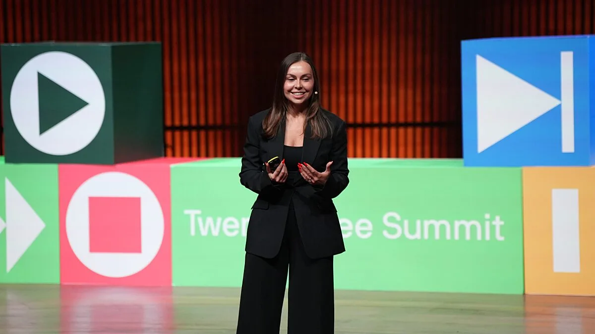 Host on the Summit stage